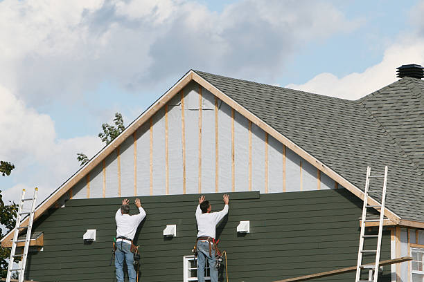 Professional Siding Replacement technician working in Powell, OH